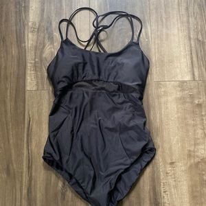 Lululemon black swimsuit with cross over back ties and mesh panel front